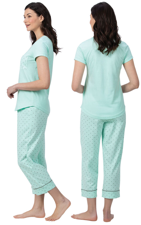 Model wearing Mint and Gray Polka Dot Short Sleeve Capri PJ for Women, facing away from the camera and then to the side
