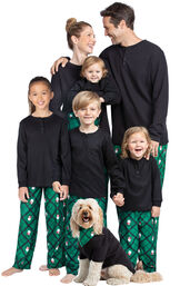 Models wearing Black and Green Snowman Argyle Matching Family Pajamas image number 0