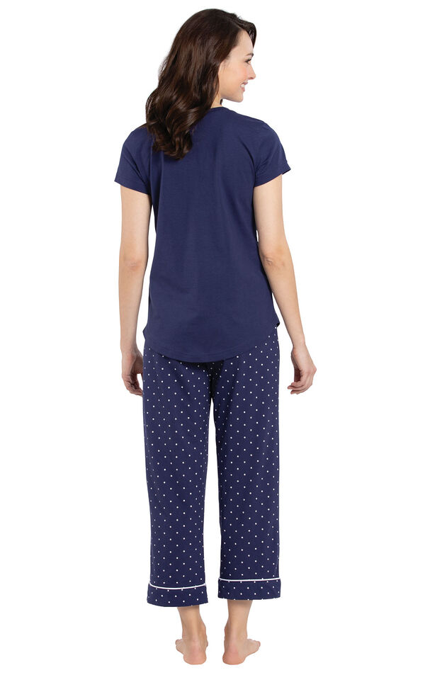 Model wearing Navy and White Short Sleeve Capri PJ for Women, facing away from the camera image number 1