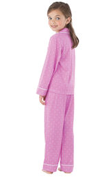 Model wearing Lavender and White Polka Dot Button-Front PJ for Youth, facing away from the camera image number 1