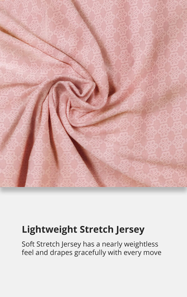 Pink Geometric Print fabric with the following copy: Soft stretch jersey has a nearly weightless feel and drapes gracefully with every move image number 5