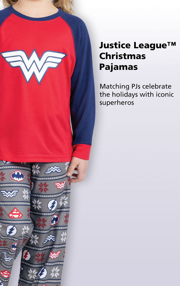 Close-up of Red and Blue Justice League Girls PJ Wonder Woman Top with the following copy: Matching PJs celebrate the holidays with iconic superheroes image number 2