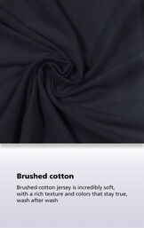 Black fabric with the following copy: our oh-so-soft collection gets softer with each wash image number 4