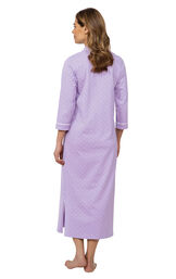 Model wearing Purple with White Polka Dot Gown for Women facing away from the camera image number 1