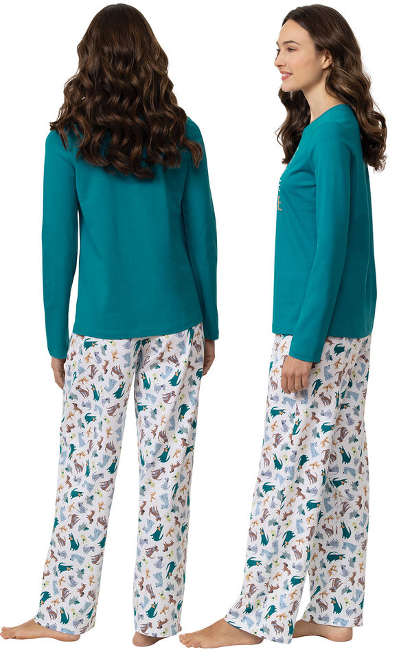 Model wearing Teal and White "Dogs are my favorite people" Pajamas, facing away from the camera and then to the side image number 1