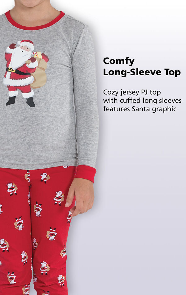 Close-up of St. Nick PJs Comfy Long-Sleeve Top with the following copy: Cozy jersey PJ top with cuffed long sleeves features Santa Graphic image number 2