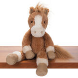 15" Buddy Pony - Front view of seated golden brown horse with ivory muzzle and brown eyes on a shelf image number 0