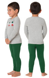 Model wearing Green and Gray Holiday Argyle Toddler Pajamas, facing away from the camera and then facing to the side image number 1
