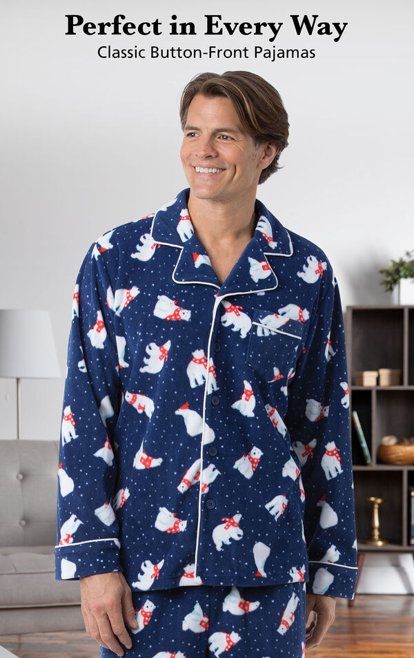Model wearing Polar Bear Fleece Men's Pajamas by a couch with the following copy: Perfect in Every Way - Classic Button-Front Pajamas image number 2