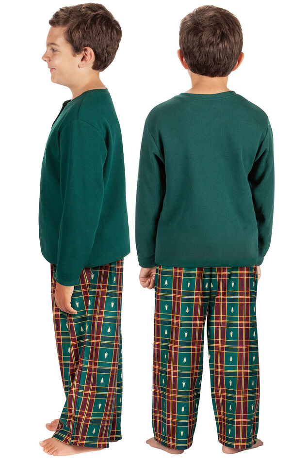 Model wearing Red and Green Christmas Tree Plaid Thermal Top PJ for Kids, facing away from the camera and then to the side image number 1