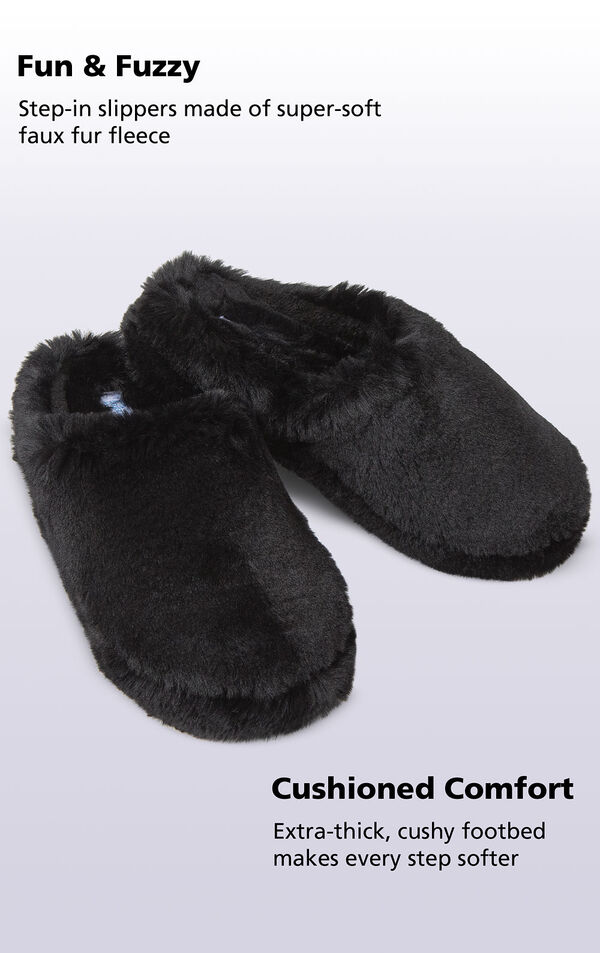 Black Fuzzy Wuzzies slippers with the following copy: step-in slippers made of super-soft faux fur fleece. Extra-thick, cushy footbed makes every step softer image number 1