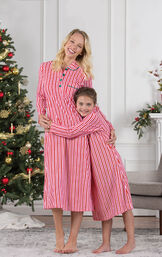Mother and daughter wearing candy cane fleece matching nighties image number 2