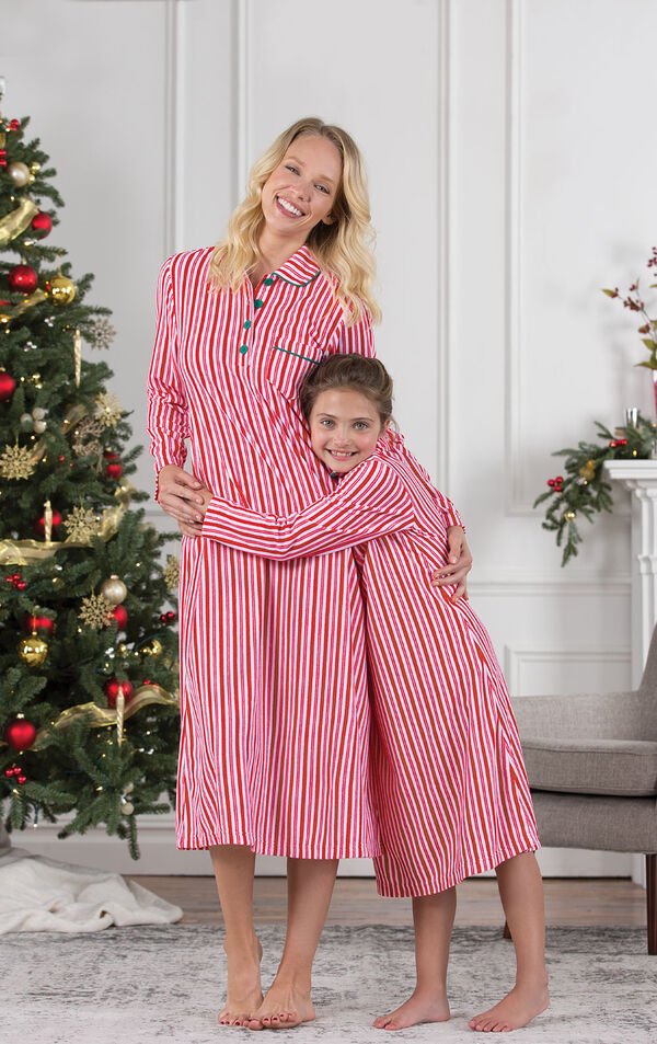 Mother and daughter wearing candy cane fleece matching nighties image number 2