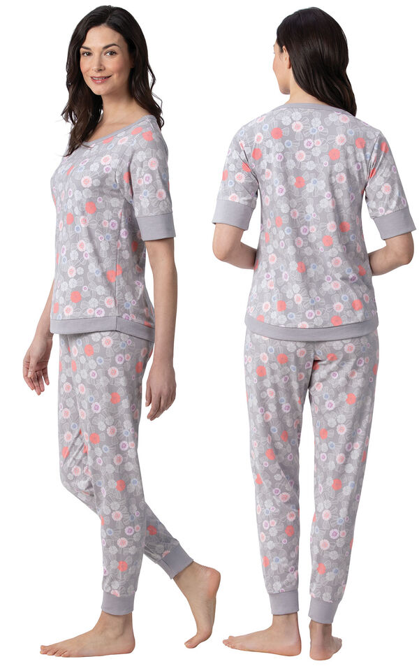Model wearing Gray Flower Print Jogger PJ for Women, facing away from the camera and then to the side image number 1