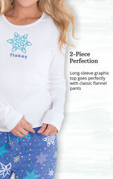 Long-sleeve graphic top goes perfectly with classic flannel pants image number 2