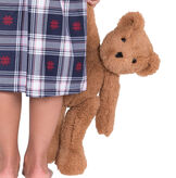 15" Buddy Bear - Front view of Slim seated honey brown bear with brown eyes being held by right arm of a young girl and a nightgown. image number 0