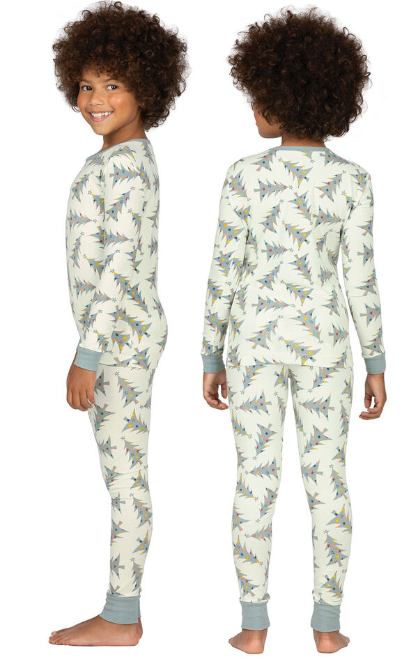 Model wearing Green Pine Tree PJ for Girls, facing away from the camera and then to the side image number 1