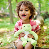 15" Buddy Frog - Plush green slim frog sitting in a forest with a child image number 1