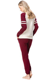 Model wearing Sunday Funday Pajamas - Burgundy, facing away from the camera image number 1