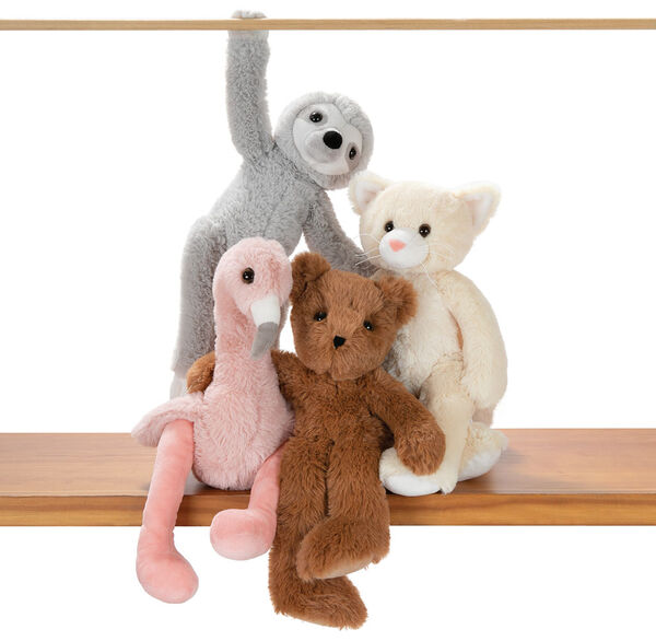 15" Buddy Kitten - Slim honey brown bear, pink flamingo, gray sloth and tan kitten posing on a shelf