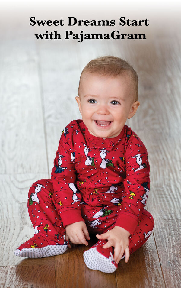 Infant sitting down wearing Snoopy and Woodstock Infant Onesie Pajamas image number 1