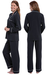 Model wearing Solid Jersey Boyfriend Pajamas - Black, facing away from the camera and then facing to the side image number 1