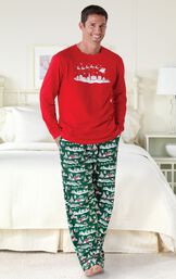 Model standing by bed wearing The Night Before Christmas Men's Pajamas image number 1