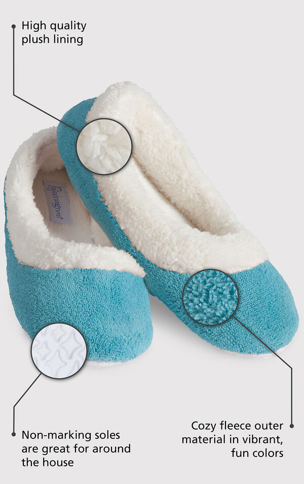 Close up of the Teal World's Softest Slipper with the following copy: High quality plush lining adds warmth and a touch of glamour. Non-marking soles are great for around the house. The softest pile fleece and an extra-padded footbed image number 1