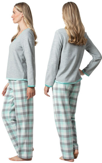 Model wearing Aqua Plaid Fleece PJ for Women, facing away from the camera and then to the side