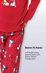 Close-up of warm red PJ pants with the following copy: full-length jersey pajama pants with allover festive Snoopy print. image number 3