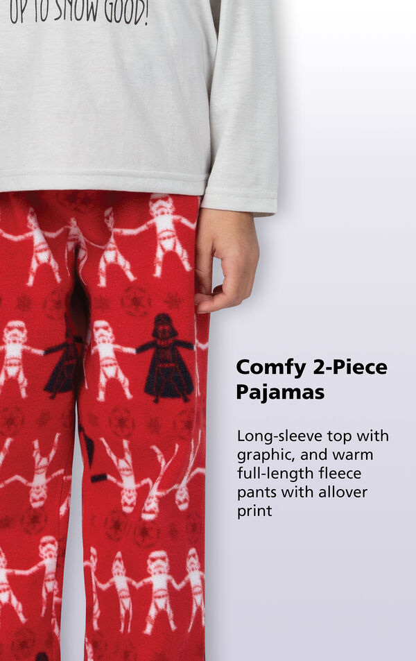 Red Star Wars Girls Pajamas feature a long-sleeve top with "Up To Snow Good!" graphic, and warm full-length fleece pants with allover print