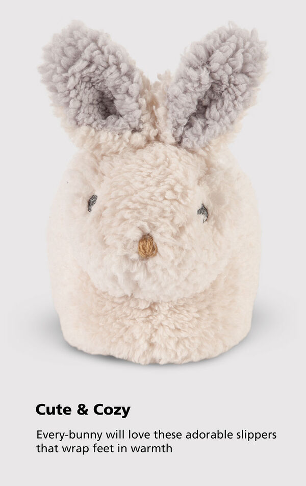 Cream and gray colored Sherpa Fleece Bunny Slippers with the following copy: Cute and Cozy - every-bunny will love these adorable slippers that wrap feet in warmth image number 3