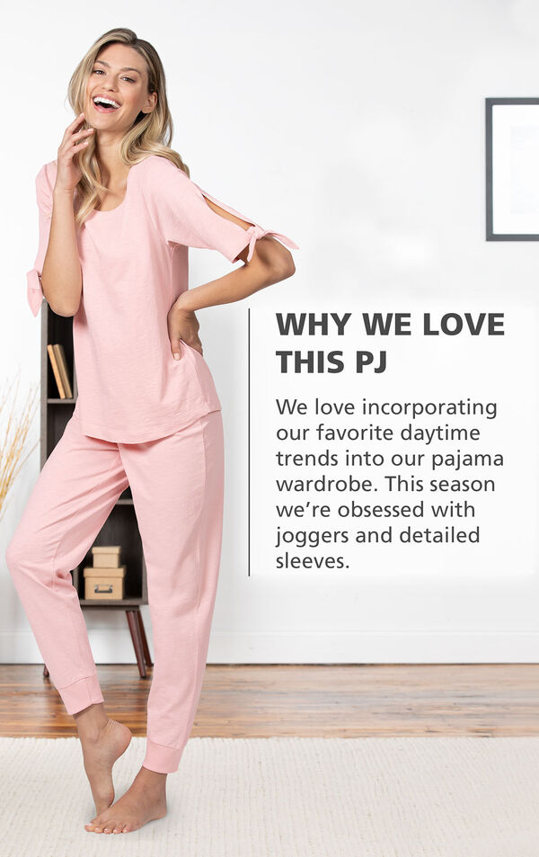 Model wearing Blush Pink Peekaboo Pajamas with the following copy: Why We Love This PJ: We love incorporating our favorite daytime trends into our pajama wardrobe. This season we're obsessed with joggers and detailed sleeves. image number 2