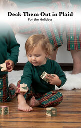 Infant playing with blocks wearing Red and Green Christmas Tree Plaid Infant Pajamas image number 2