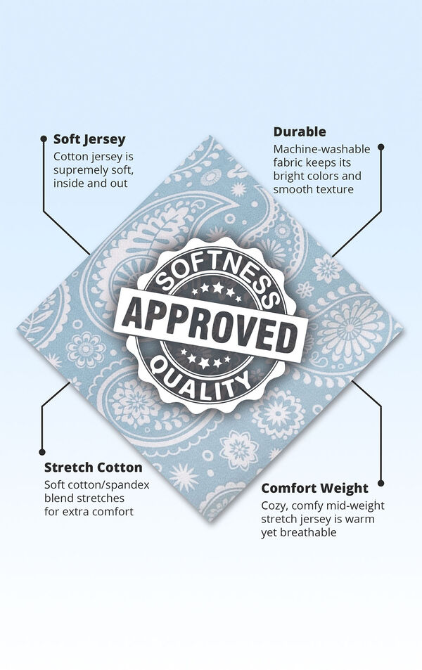 Blue and white paisley print fabric swatch with the following copy: cotton jersey is supremely soft. Machine washable fabric keeps its bright colors. Soft cotton/spandex blend for extra comfort. Cozy, comfy mid-weight stretch jersey is warm yet breathable.