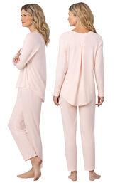 Model wearing Light Pink Scoop Neck Pajama Set for Women, facing away from the camera and then to the side image number 1