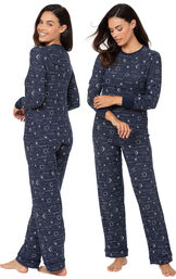 Model wearing Navy Blue Sun and Moon Print PJs for Women, facing away from the camera and then facing to the side image number 1