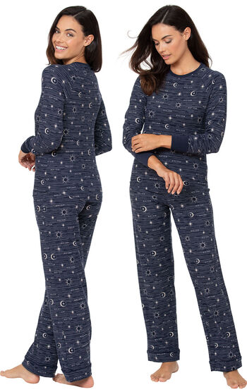 Model wearing Navy Blue Sun and Moon Print PJs for Women, facing away from the camera and then facing to the side