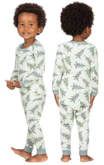 Model wearing Green Pine Tree PJ for Infants, facing away from the camera and then to the side