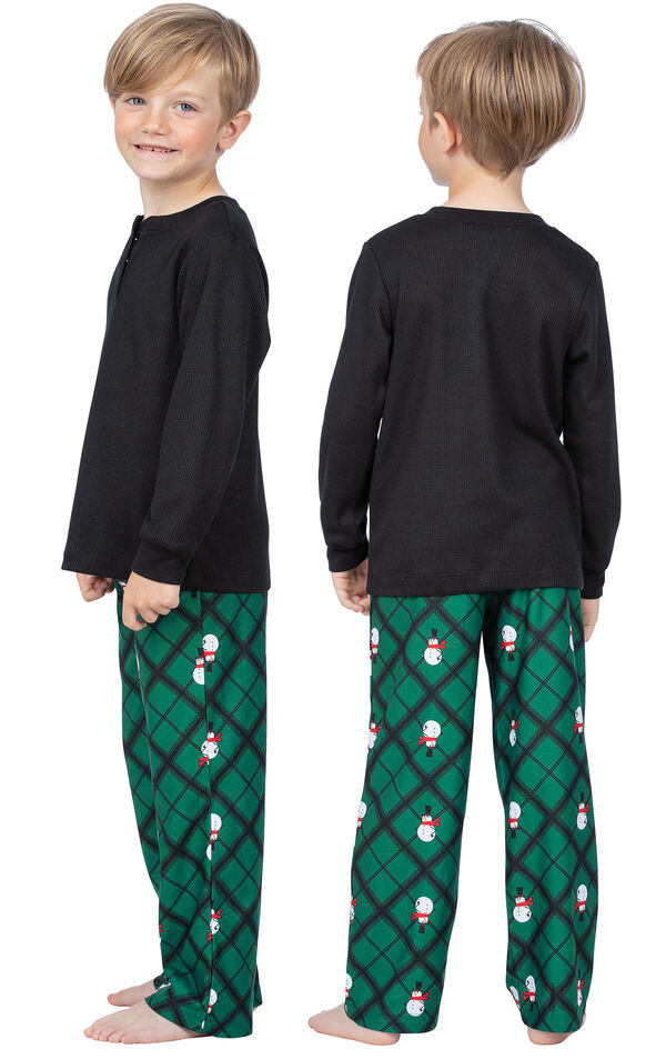 Model wearing Black and Green Snowman Argyle Henley PJ for Kids, facing away from the camera and then to the side image number 1