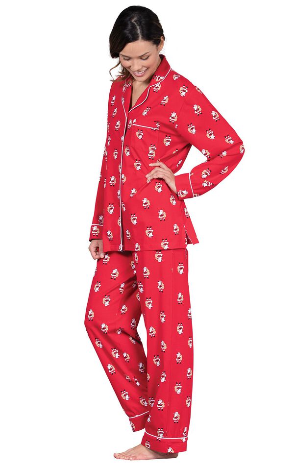 Model wearing Red St. Nick Boyfriend Pajamas, standing to the side