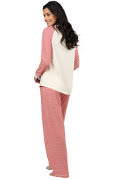 Model wearing Whisper Knit Henley Pajamas - Red Print, facing away from the camera image number 1