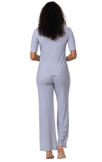 Model wearing Light Blue Stretch Knit Geo Print PJ for Women, facing away from the camera