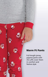 Close-up of St. Nick PJs Warm PJ Pants with the following copy: Full-length jersey pajama pants with rib cuffs cover them in comfort and festive style. image number 3