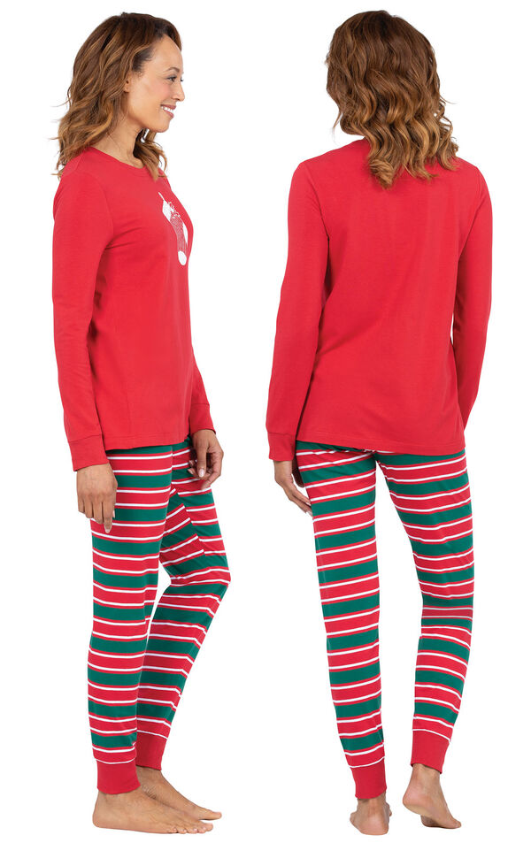 Model wearing Red and Green Christmas Stripe PJ for Women, facing away from the camera and then to the side