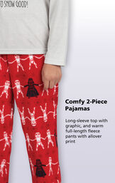 Red microfleece pants with a Darth Vader and Stormtrooper repeat pattern with the following copy: Long-sleeve jersey top with graphic and warm full-length fleece pants with allover print image number 3