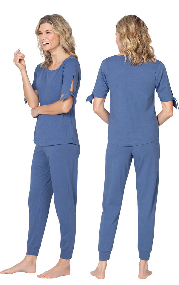 Model wearing Blue Tie Sleeve Jogger PJ for Women, facing away from the camera and then to the side image number 1
