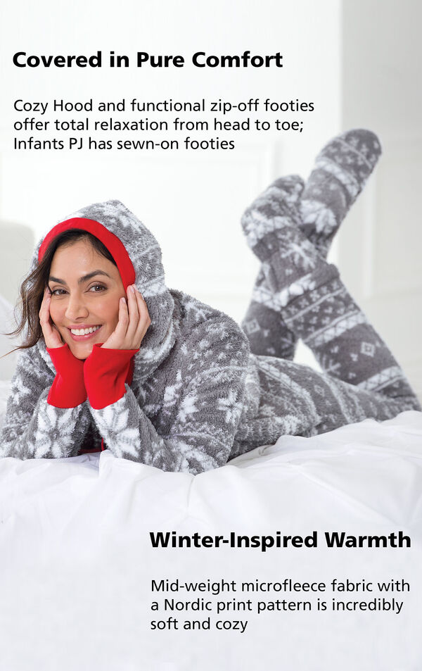 Model wearing Nordic Fleece Hoodie-Footie laying down with the following copy: Cozy Hood and function zip-off footies offer total relaxation from head to toe; Infants PJ has sewn-on footies. Mid-weight microfleece fabric with a Nordic print pattern image number 2