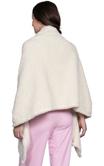 Model wearing Fleece Wrap - White, facing away from the camera