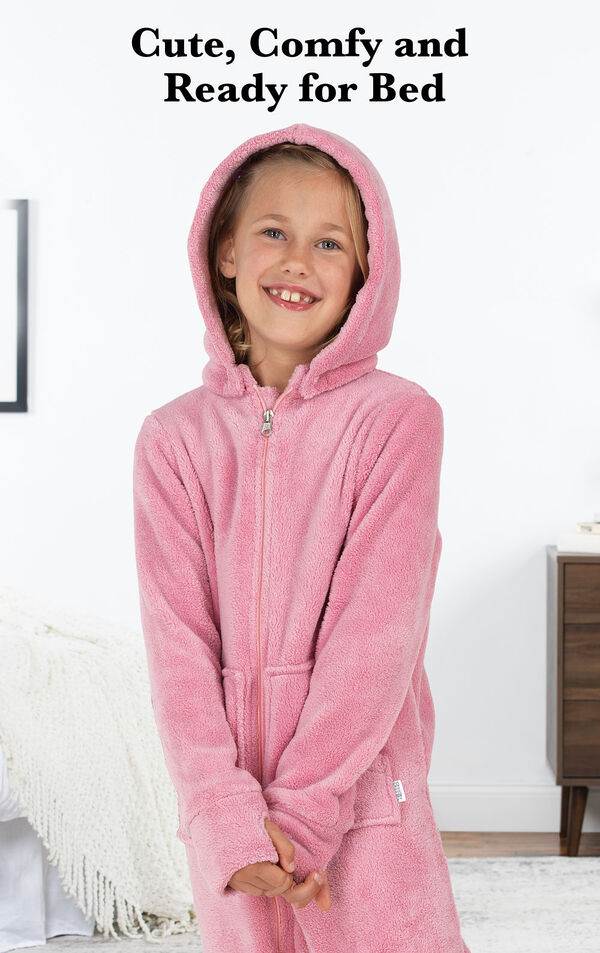 Girl wearing Pink Hoodie-Footie with the following copy: Cute, Comfy and Ready for Bed. image number 1